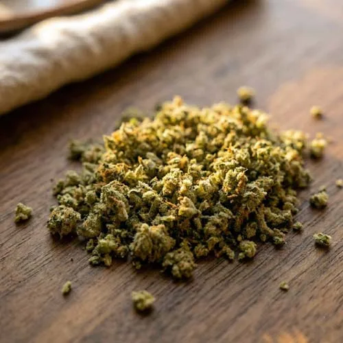 Close-Up of Properly Ground Cannabis Texture the First Step When learning How to Pack a Cone